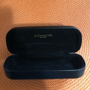 Coach eye glass case.